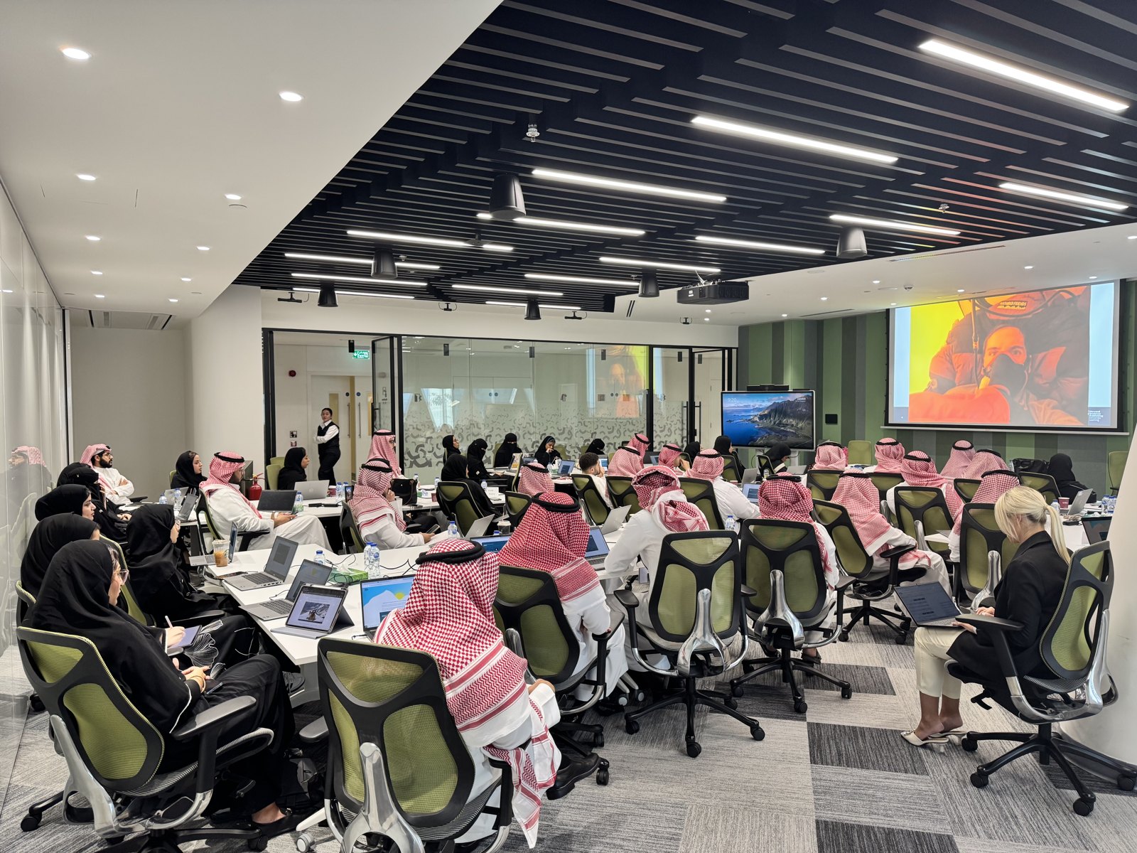 Leaders participating in a facilitated classroom dialogue in Saudi Arabia.